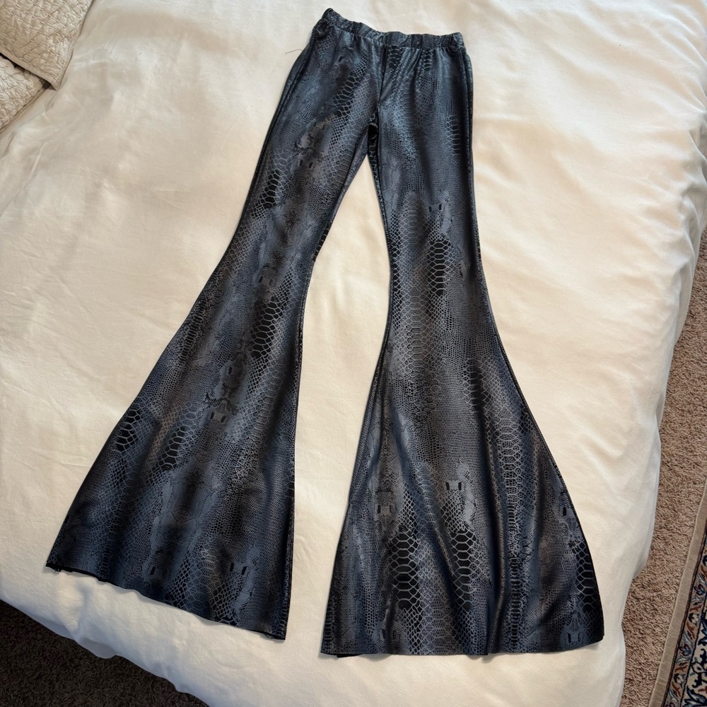 Hearts & Saints stretch snake print flare pants. I